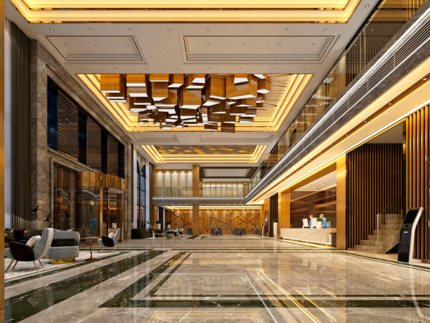 Finished luxury hotel lobby with lighting, marble, and reception area